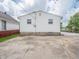 A concrete patio behind a house provides space for outdoor activities and convenient parking at 2909 S Randolph St, Indianapolis, IN 46203
