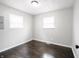 Bright bedroom with windows is freshly painted at 2909 S Randolph St, Indianapolis, IN 46203