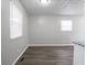 Dining room features laminate flooring, neutral paint, and bright windows at 2909 S Randolph St, Indianapolis, IN 46203