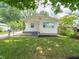 Charming single-story home with a well-maintained lawn and freshly painted exterior at 2909 S Randolph St, Indianapolis, IN 46203