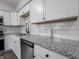 Kitchen featuring granite countertops, stainless steel appliances, and subway tile backsplash at 2909 S Randolph St, Indianapolis, IN 46203