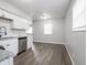 Updated kitchen with laminate flooring, stainless steel appliances, and bright windows at 2909 S Randolph St, Indianapolis, IN 46203