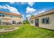 Spacious backyard with a fire pit area, storage shed, and a well-maintained deck at 296 Myers Lake Dr, Noblesville, IN 46062