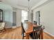 Traditional dining room with wood floors and a stylish chandelier, perfect for Gathering meals and entertaining guests at 296 Myers Lake Dr, Noblesville, IN 46062