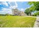 Inviting home featuring a manicured lawn, mature trees, and a three-car garage for ample parking at 296 Myers Lake Dr, Noblesville, IN 46062