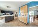 Spacious kitchen connected to the living and dining areas, featuring wooden cabinets and an island, great for entertaining at 296 Myers Lake Dr, Noblesville, IN 46062