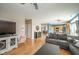 Open-concept living room seamlessly connects to the kitchen and dining area, featuring hardwood floors throughout at 296 Myers Lake Dr, Noblesville, IN 46062