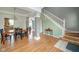 Spacious living space featuring an open floor plan and hardwood floors, blending the dining, kitchen, and foyer at 296 Myers Lake Dr, Noblesville, IN 46062