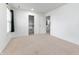 Bright bedroom with beige carpeting, and a door leading to additional rooms at 3058 Mcintosh Dr, Bargersville, IN 46106