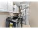 Bright laundry room with modern washer and dryer, ample cabinetry, and utility fixtures at 3058 Mcintosh Dr, Bargersville, IN 46106