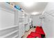 Spacious walk-in closet with custom shelving, drawers, and space for storage totes at 3058 Mcintosh Dr, Bargersville, IN 46106