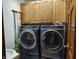 Laundry room with gray washer and dryer at 3422 Sycamore Dr, Columbus, IN 47203