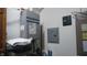 Utility room featuring a water heater, electrical panels, and other essential systems of the home at 3422 Sycamore Dr, Columbus, IN 47203