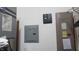 Functional utility area showcasing the electrical and breaker panels at 3422 Sycamore Dr, Columbus, IN 47203