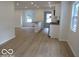Open concept kitchen with modern appliances, island, and ample cabinet space at 3455 Brouse Ave, Indianapolis, IN 46218