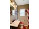 Clean bathroom featuring a vanity sink, decorative mirror, and shower with curtain at 3508 Brouse Ave, Indianapolis, IN 46218