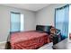 Cozy bedroom featuring warm tones, a comfortable bed, and soft lighting at 3508 Brouse Ave, Indianapolis, IN 46218