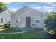 Charming single-story home with gray siding, manicured lawn, and welcoming front entrance at 3508 Brouse Ave, Indianapolis, IN 46218