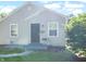 Charming single-story home with gray siding, a dark front door, and freshly cut lawn at 3508 Brouse Ave, Indianapolis, IN 46218