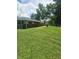 Expansive backyard features well-maintained lawn and a patio area, perfect for outdoor entertaining at , Indianapolis, IN 46227