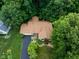 Captivating aerial perspective showcasing the property's roof, landscaping, and the surrounding verdant scenery at 3813 N Ramsgate Rd, Martinsville, IN 46151