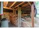 Spacious unfinished basement storage or workshop with wood piles at 3813 N Ramsgate Rd, Martinsville, IN 46151