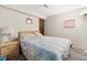 Comfortable bedroom featuring a queen-sized bed and neutral decor at 3813 N Ramsgate Rd, Martinsville, IN 46151