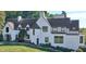 Charming two-story home with a classic tudor design, featuring a beautifully landscaped front yard at 3813 N Ramsgate Rd, Martinsville, IN 46151