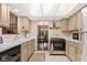 A classic kitchen with white countertops and light wood cabinets at 3813 N Ramsgate Rd, Martinsville, IN 46151