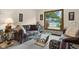 Inviting living room boasts scenic lake views from a large window at 3813 N Ramsgate Rd, Martinsville, IN 46151