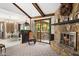 Spacious living room combines dining area and a stone fireplace feature at 3813 N Ramsgate Rd, Martinsville, IN 46151