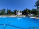 Inviting community pool with an expansive deck, perfect for relaxation and recreation at 3813 N Ramsgate Rd, Martinsville, IN 46151