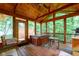 Enclosed sunroom with wood ceiling, hot tub, screened windows and an outdoor view at 3813 N Ramsgate Rd, Martinsville, IN 46151