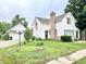 Charming two-story home with a detached garage and a well-manicured front yard with mature trees at 4096 N 200 W, Greenfield, IN 46140