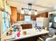 Functional kitchen featuring laminate countertops, wood cabinets, double sinks and good natural light at 4096 N 200 W, Greenfield, IN 46140