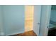 Bathroom area featuring a door, sink, and tiled floors inside of this potential home at 4219 Mathews Ave, Indianapolis, IN 46227