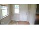 Bright entryway with tile and wood flooring, door with glass and window at 4219 Mathews Ave, Indianapolis, IN 46227