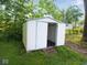 Outdoor shed with white siding featuring a door to store equipment and supplies at 4219 Mathews Ave, Indianapolis, IN 46227