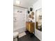 Clean bathroom featuring a modern vanity, shower, and contemporary decor at 5704 Carrousel Dr, Indianapolis, IN 46254