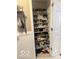 A walk-in closet well stocked with various shoes, providing ample storage at 6334 Winslow Dr, Indianapolis, IN 46237
