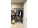 Organized closet space with clothing rack and built-in shelving for ample storage at 6334 Winslow Dr, Indianapolis, IN 46237