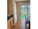 Bright kitchen/dining area leading to the backyard, perfect for Gathering meals and entertaining at 6334 Winslow Dr, Indianapolis, IN 46237