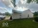 The side view of the house has vinyl siding, providing a durable exterior finish at 6334 Winslow Dr, Indianapolis, IN 46237