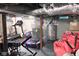 Unfinished basement with exercise equipment, offering potential for a home gym at 643 Harlan St, Plainfield, IN 46168
