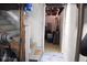 Unfinished basement leading to storage with stairs, offering potential for customization at 643 Harlan St, Plainfield, IN 46168