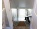 Basement staircase leading to a lower level, offering potential for additional living or storage space at 643 Harlan St, Plainfield, IN 46168
