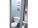 Cozy bathroom features a boat-shaped storage unit, complemented by a decorative starfish at 643 Harlan St, Plainfield, IN 46168