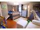 Cozy bedroom with charming decor, featuring hardwood floors and natural light at 643 Harlan St, Plainfield, IN 46168