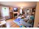 Inviting living room with a fireplace and comfortable seating at 643 Harlan St, Plainfield, IN 46168