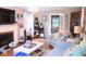 Bright living room with a fireplace, hardwood floors, and comfortable seating for cozy gatherings at 643 Harlan St, Plainfield, IN 46168